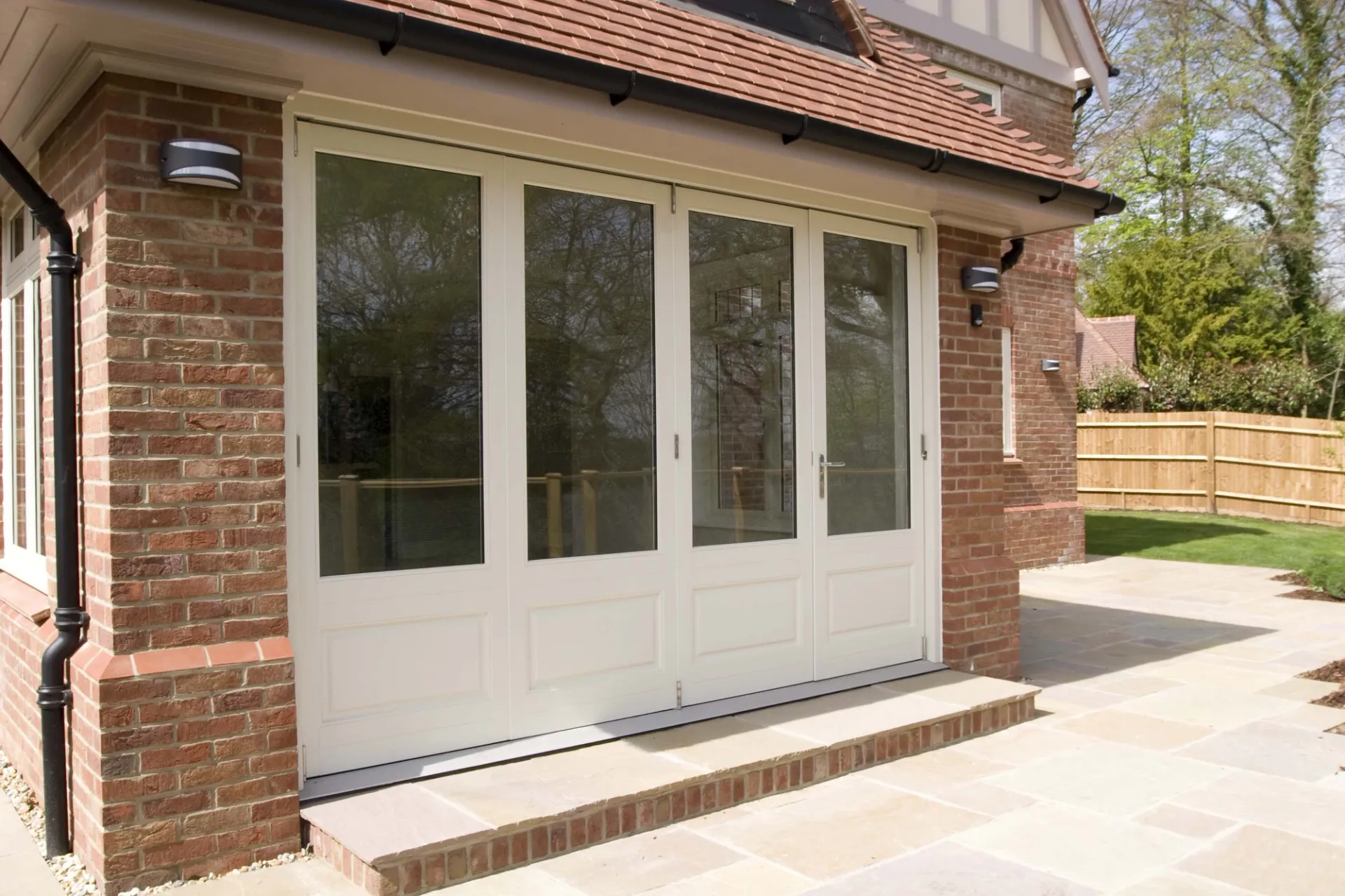 Bifold Door White Exterior - Bi-fold door in White