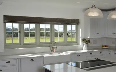 beautiful kitchen with timber casement windows