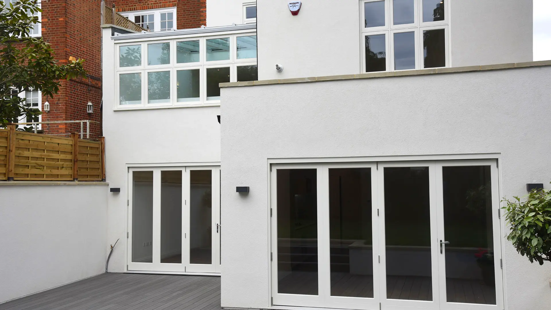 Bifold Door White Exterior 6 - Bi-fold door in White