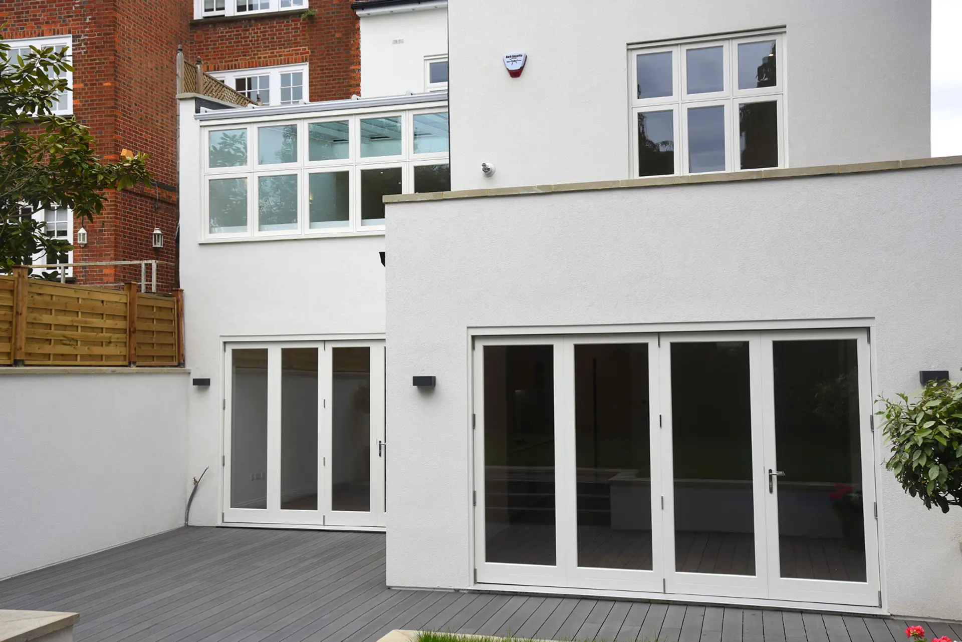 Bifold Door White Exterior 6 - Bi-fold door in White