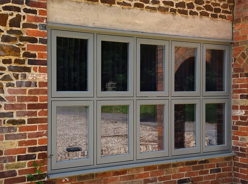 70s Home Reborn with Elegant Wooden Windows & Doors