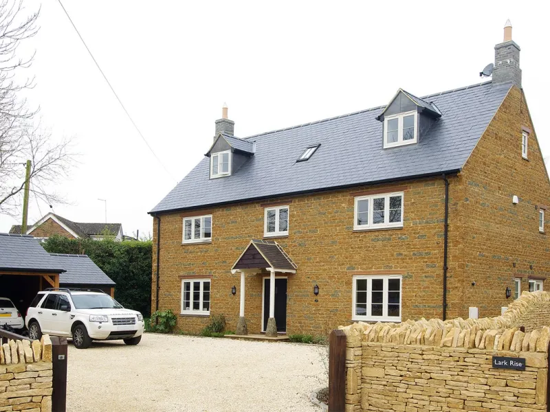 Cohesive Double Plot Development With Mumford Timber Windows