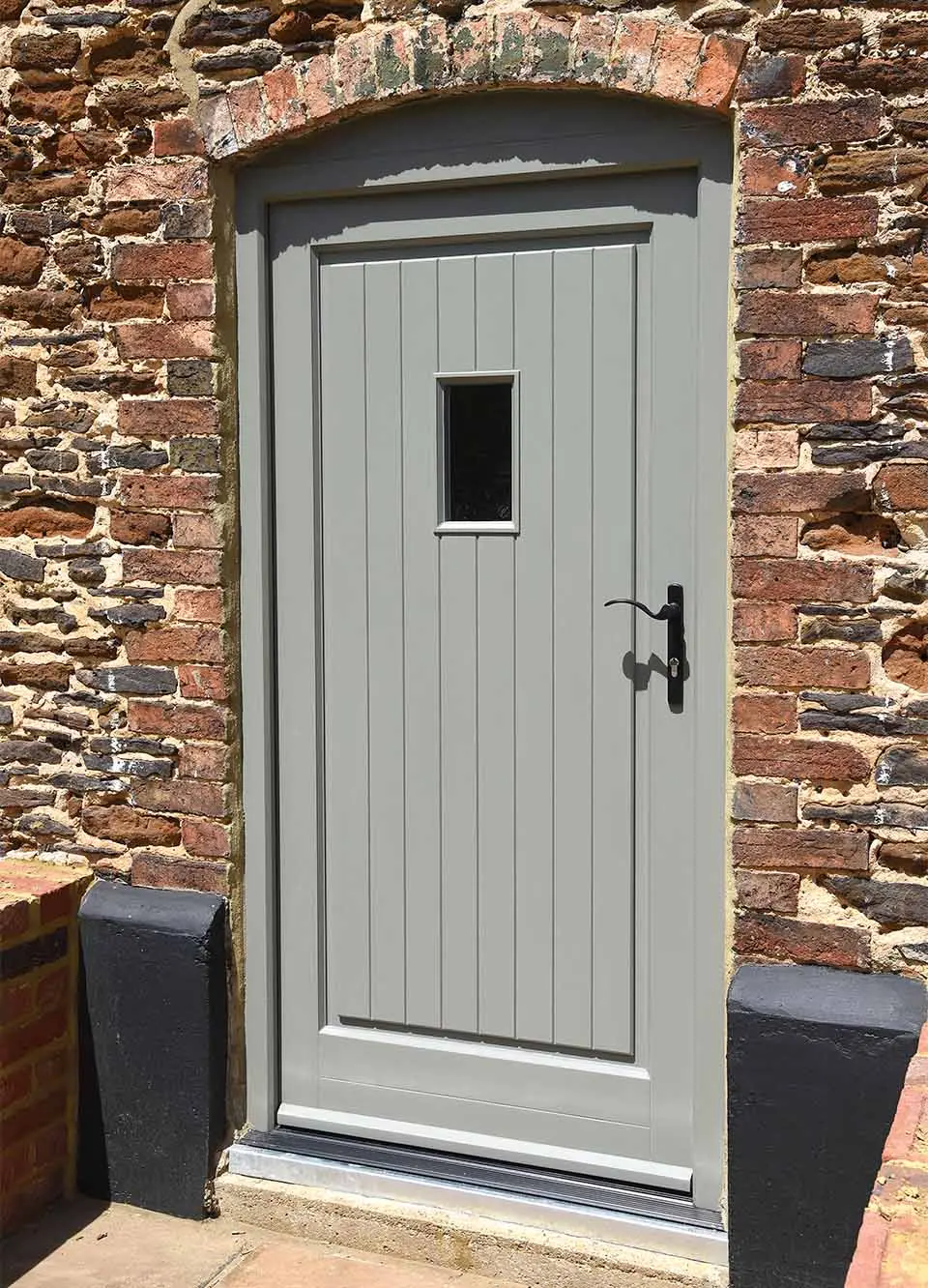 70s Home Reborn with Elegant Wooden Windows & Doors