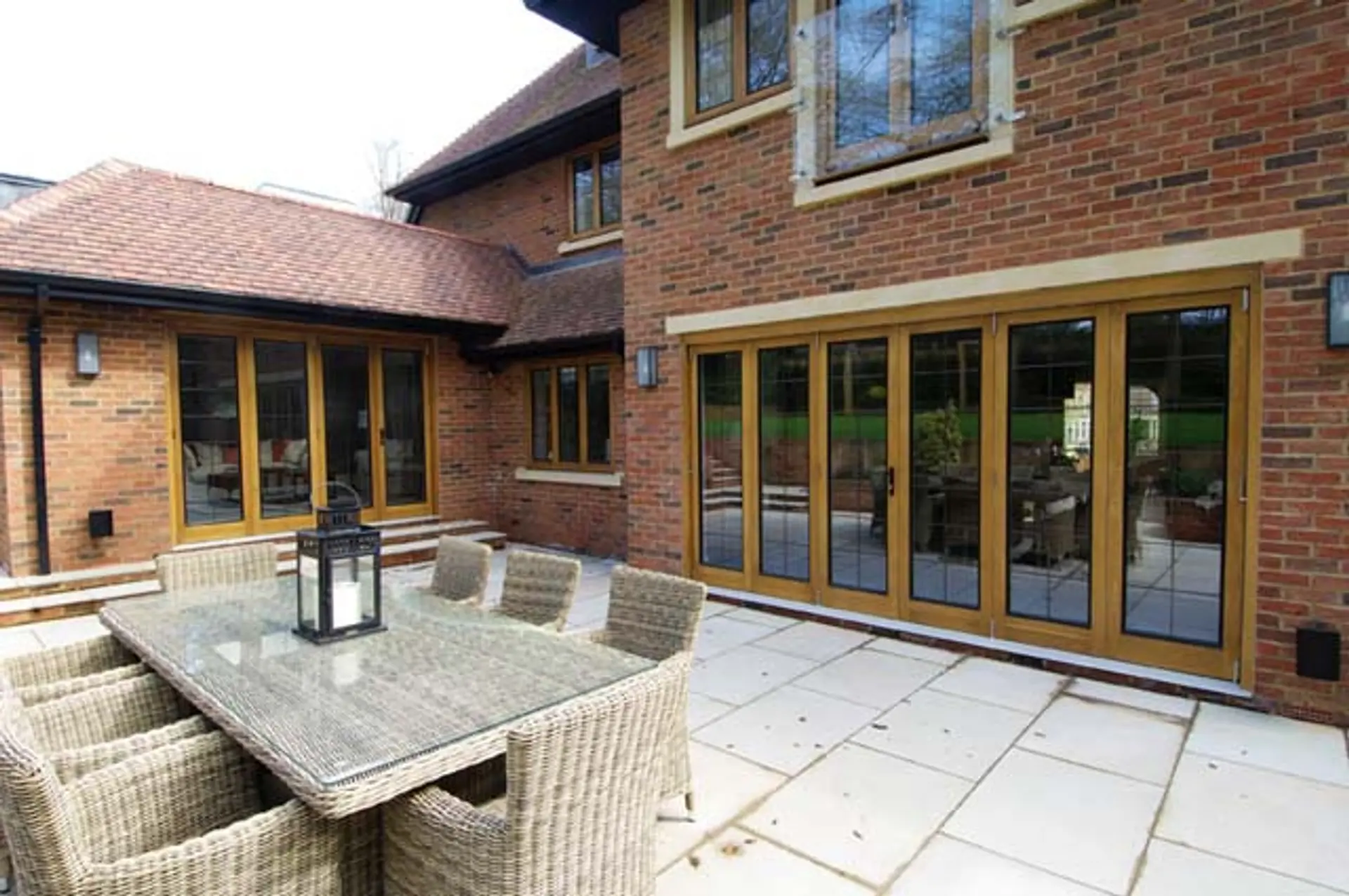 Bifold Door Stained Exterior - Bi-fold door in Stained