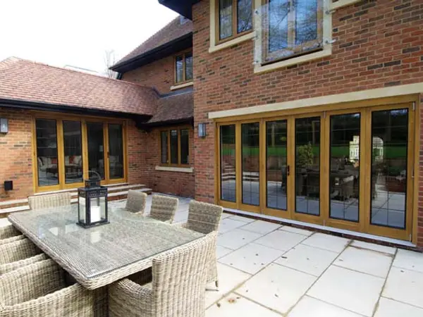 Bifold Door Stained Exterior - Bi-fold door in Stained