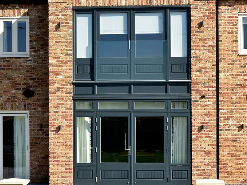 barn style new build with timber windows
