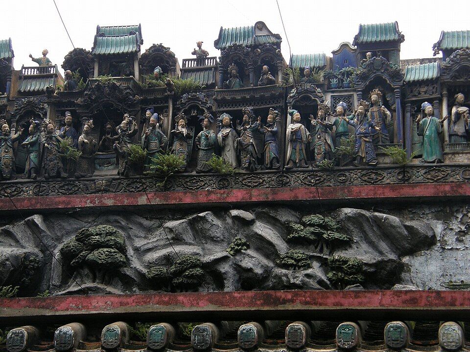 Ceramic figures and decorative roof details at Thiên Hậu Temple in Chợ Lớn