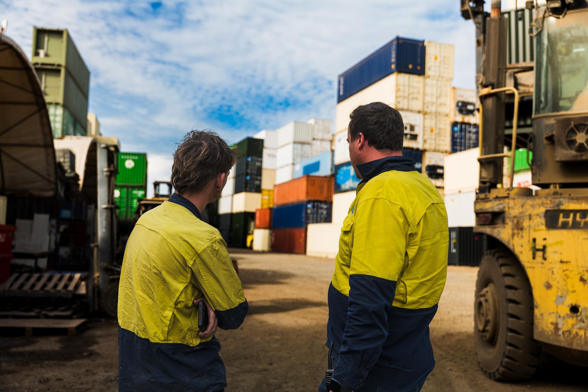 The team in discussion in the depot