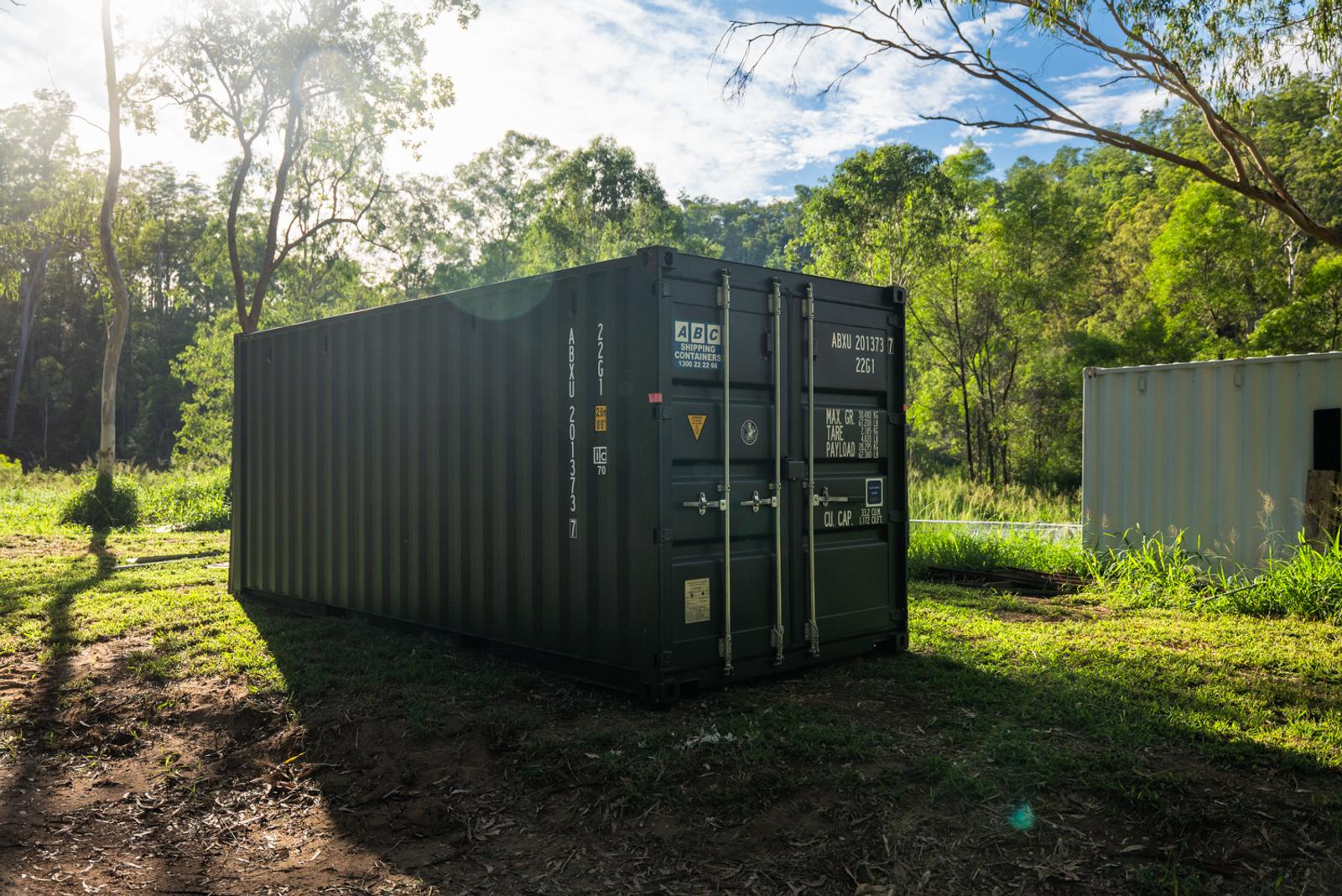 a shipping container on a rural property