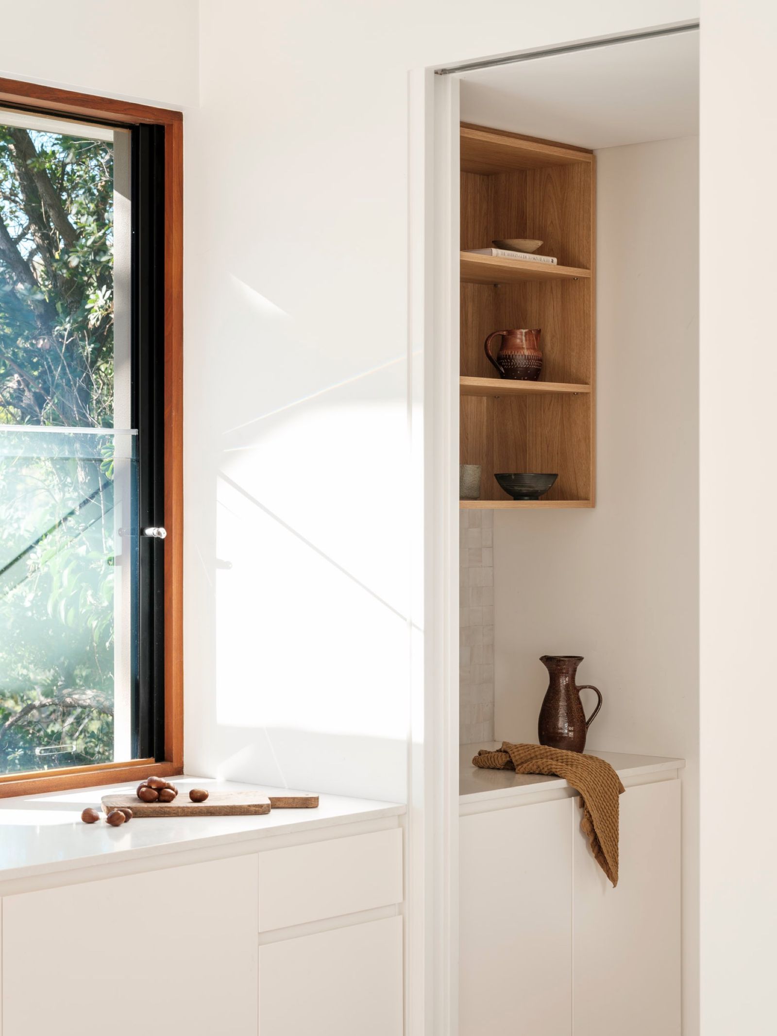 Warm oak joinery detail in afternoon light