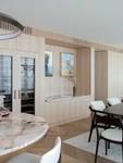 Pale timber joinery running the length of the living room