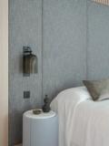 Custom sconce lighting at the master bedhead