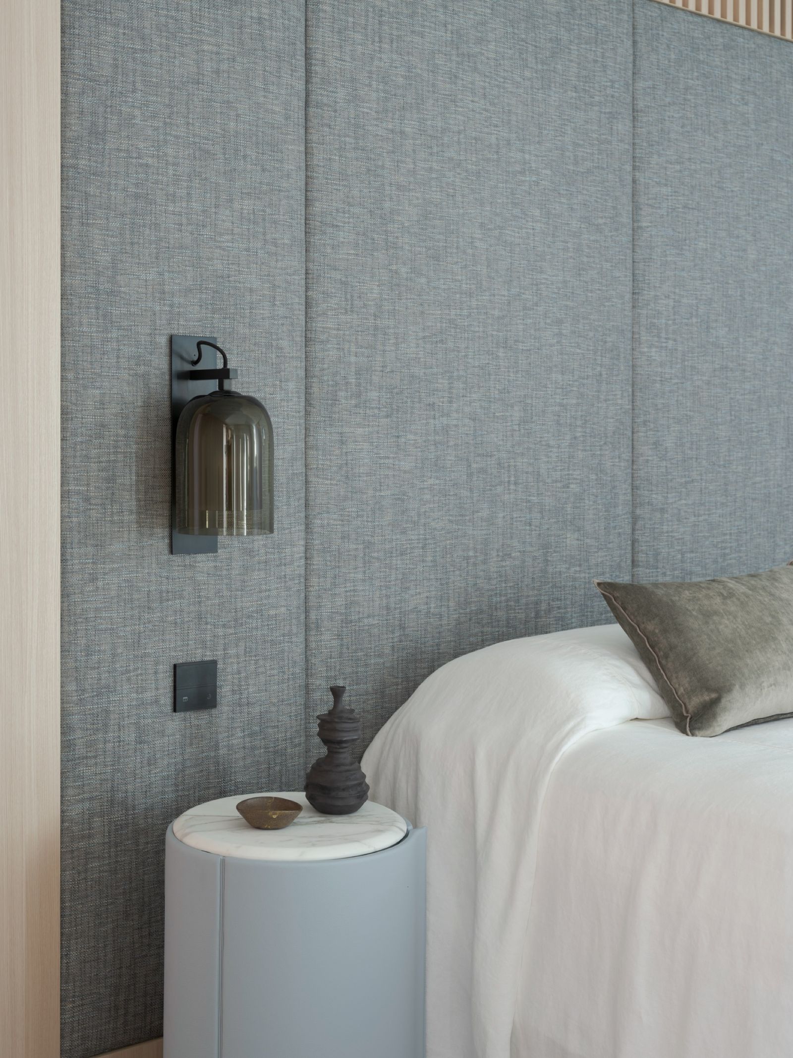 Custom sconce lighting at the master bedhead