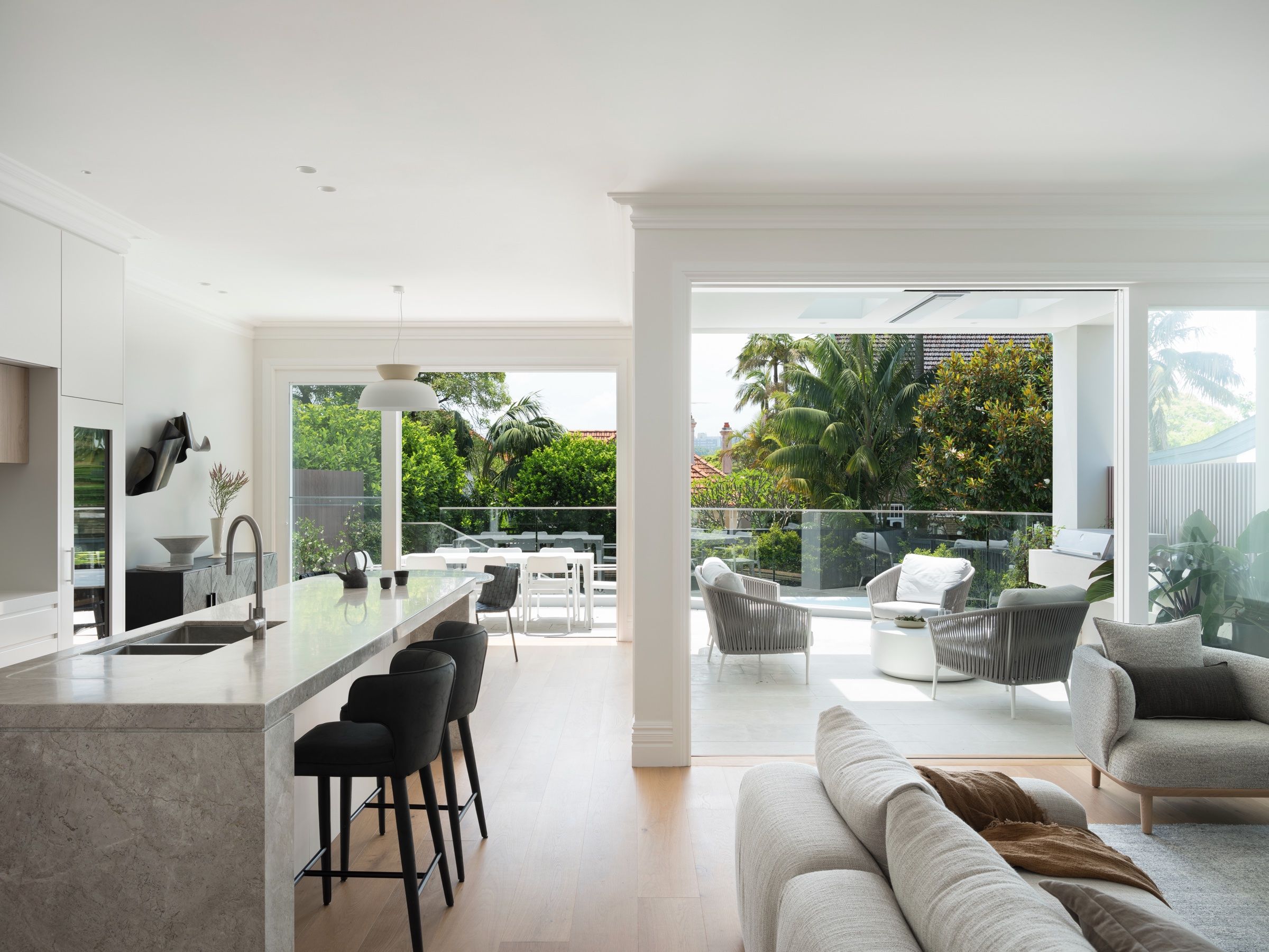 The new open-plan kitchen and living opening to the terrace