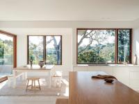 The open-plan kitchen and dining opening to the terrace