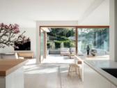 Living and dining flowing to the sun-drenched alfresco terrace
