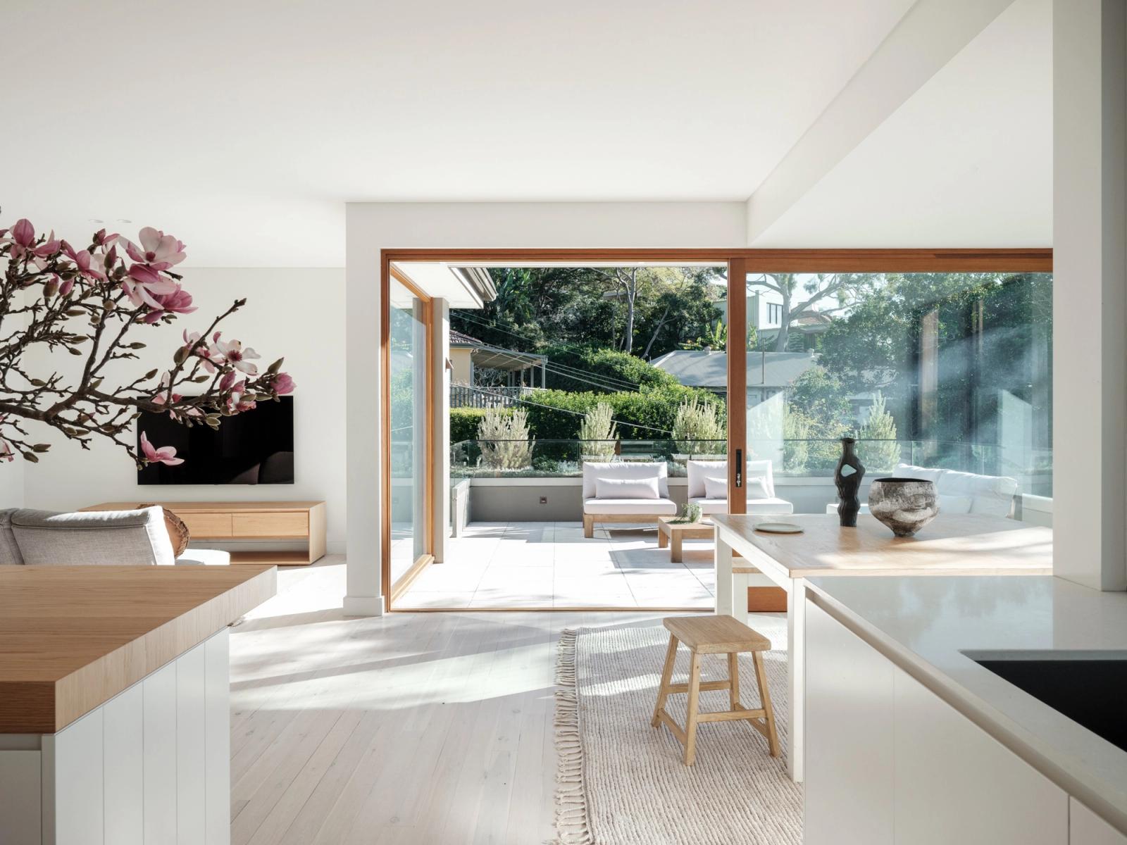 Living and dining flowing to the sun-drenched alfresco terrace