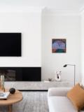 The informal living room with its black stone hearth