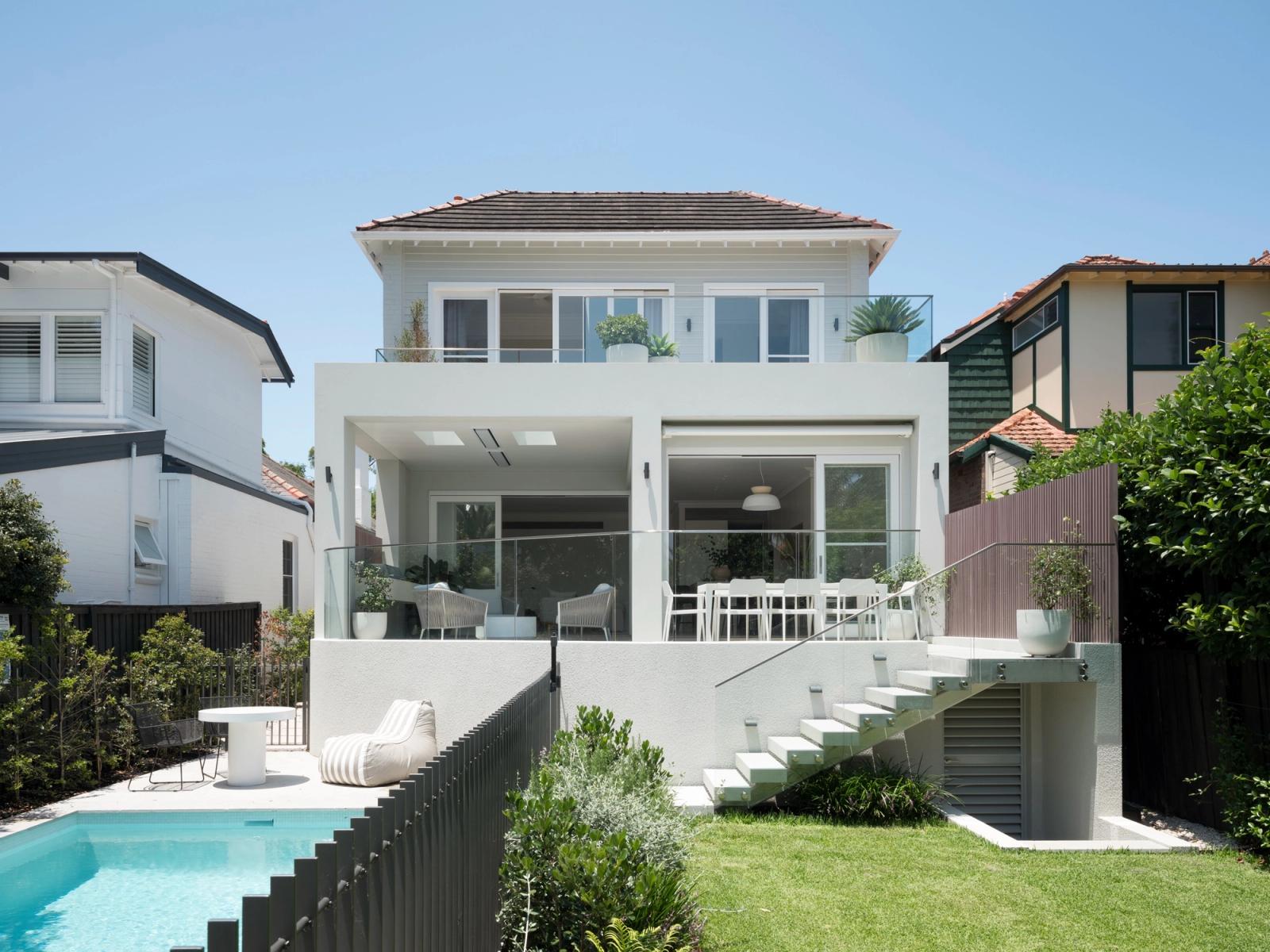 The rear elevation, new extension and pool below