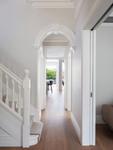 The restored Victorian archway along the entry hall