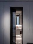 The charcoal-framed doorway through to the ensuite