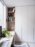 The built-in study joinery in pale oak