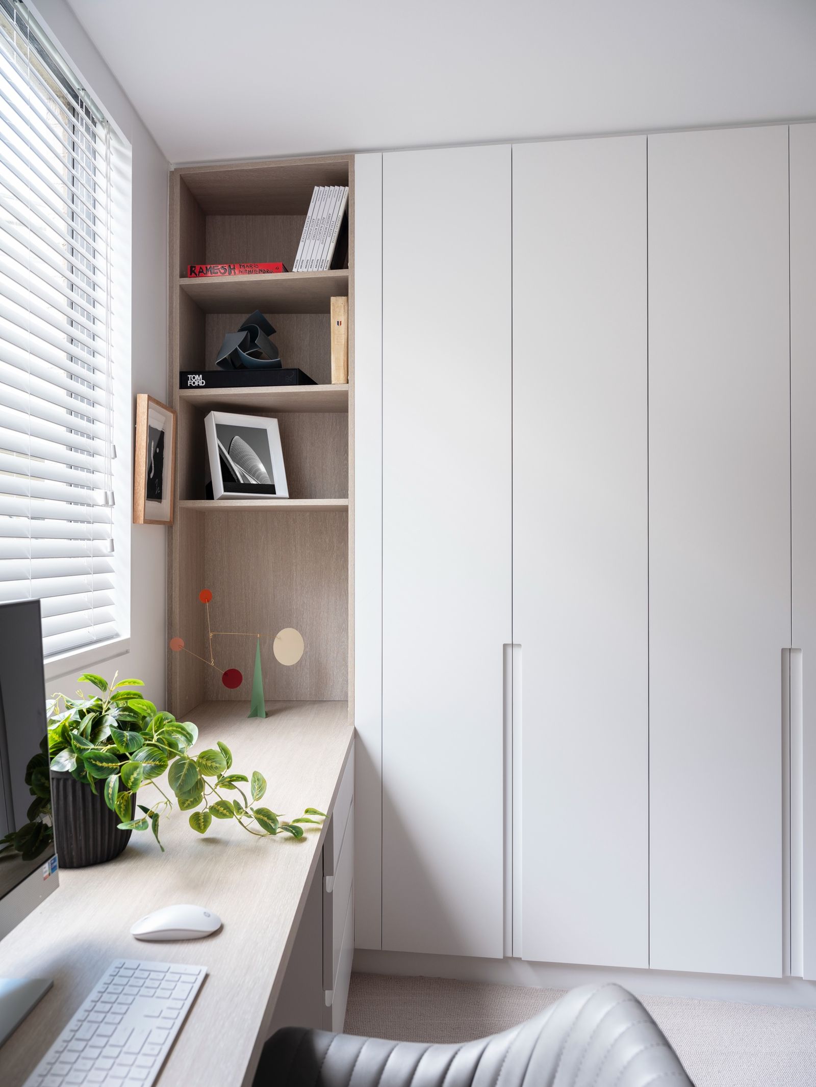 The built-in study joinery in pale oak