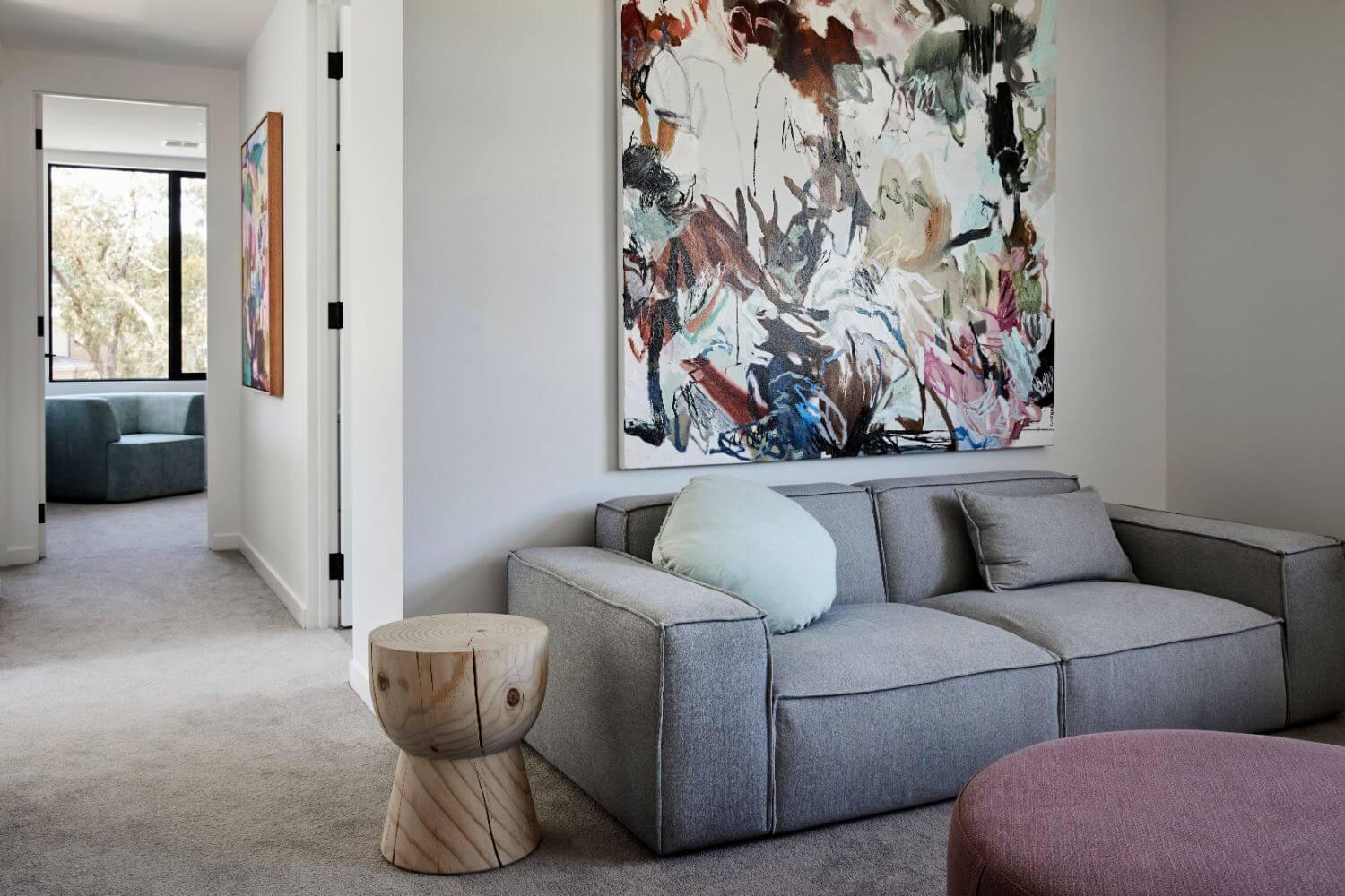 Contemporary Artwork And Side Table Adds Interest To Tonal Styling In Retreat