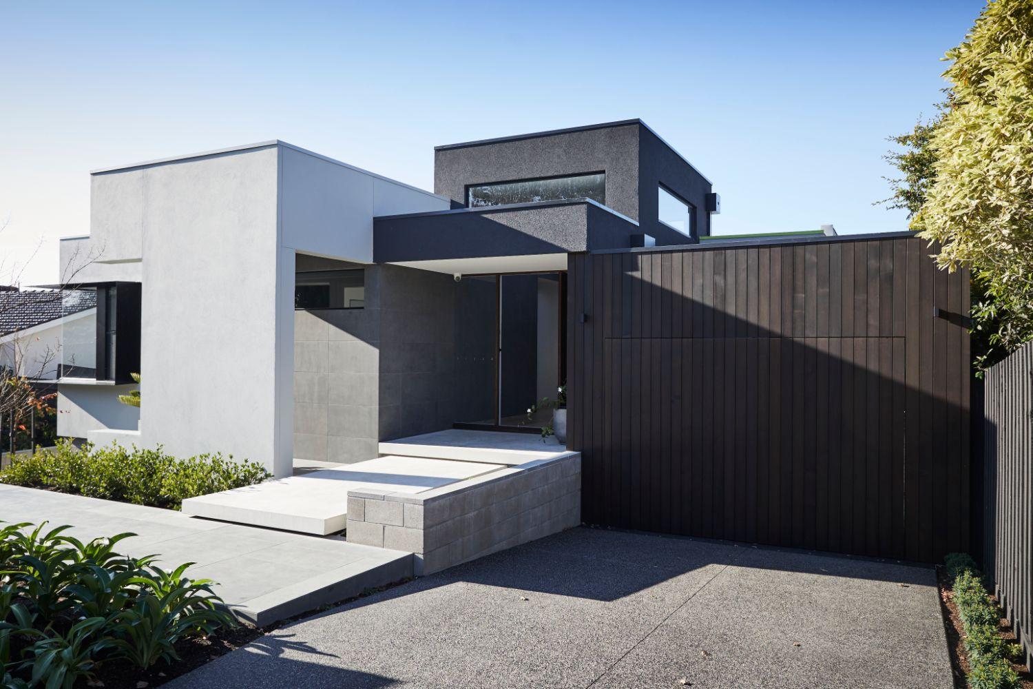 Timber Panel Tilt Garage And Exposed Aggregate Driveway