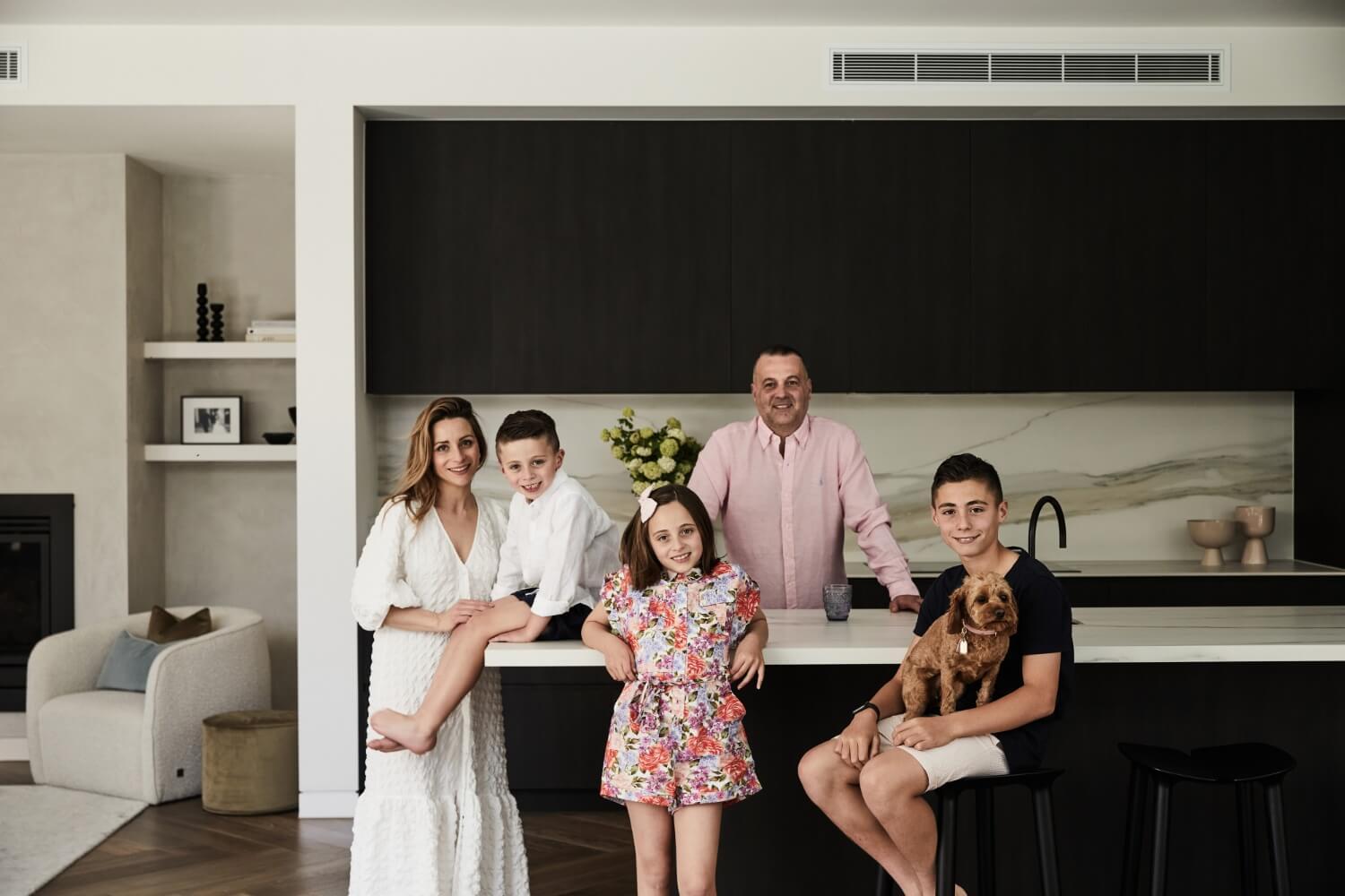 Family Enjoying Their Contemporary Home In Glen Iris