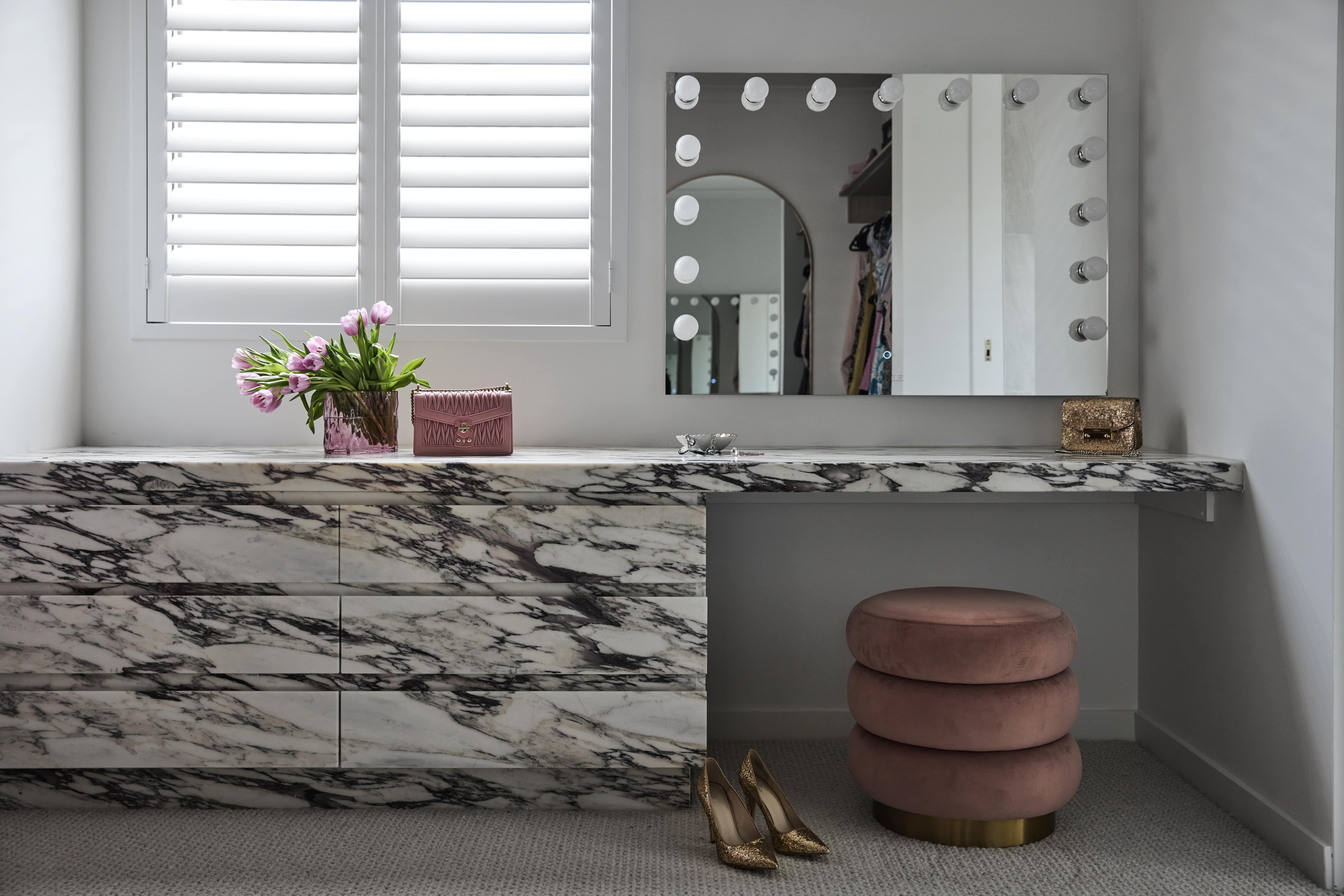 Makeup nook featuring Calacatta-clad joinery, designed and built by Thomas Archer in Melbourne.