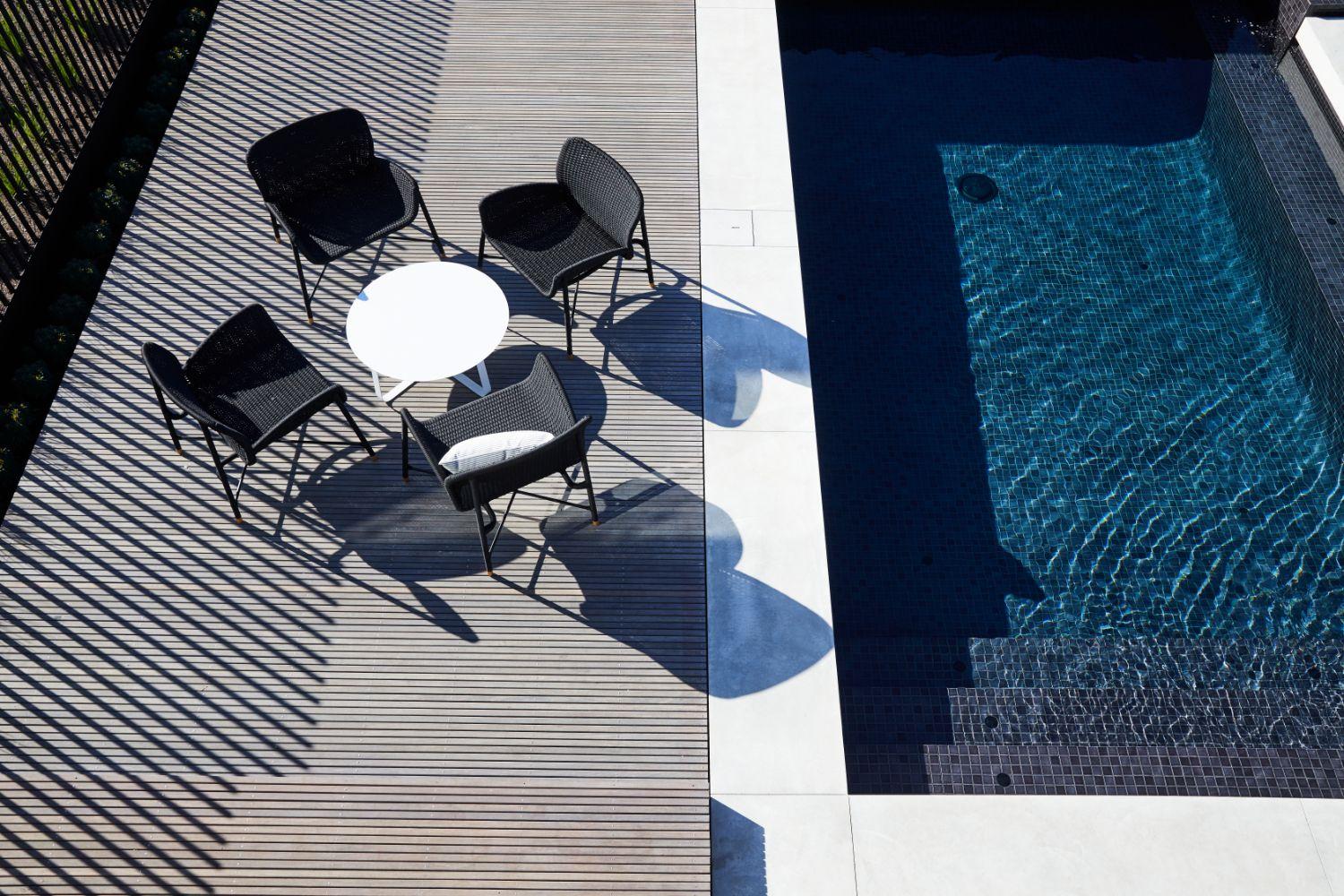 Pool Area With Contemporary Slim Decking And Concrete Pool