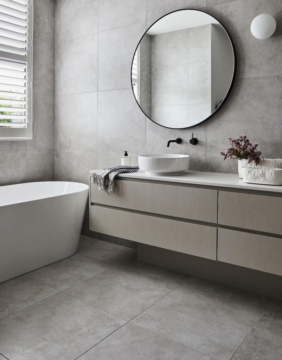 Grey Stone Tiling And Muted Timber Vanity Create Earthy Tone In Ensuite