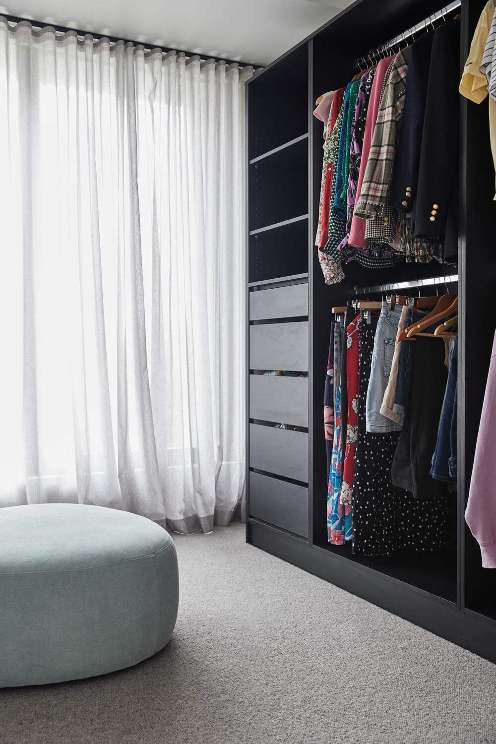 Simple Black Shelving In Walk In Robe