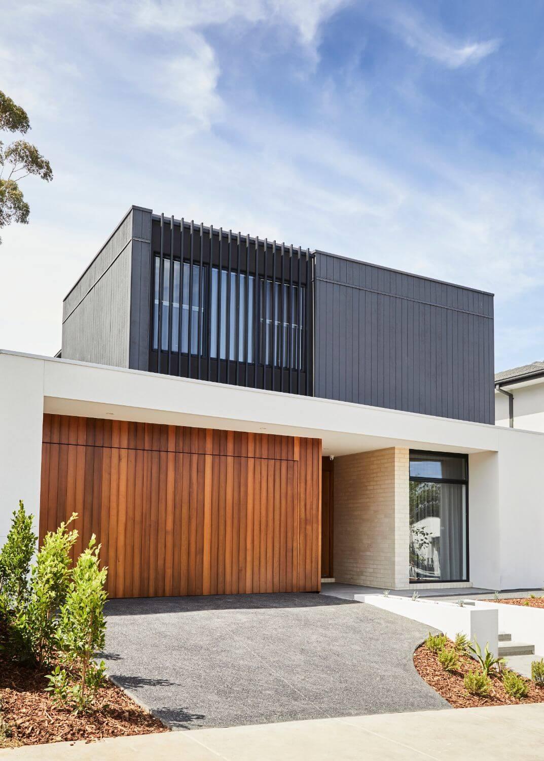 Warm Contemporary Facade With Black Steel Screen Feature In Doncaster