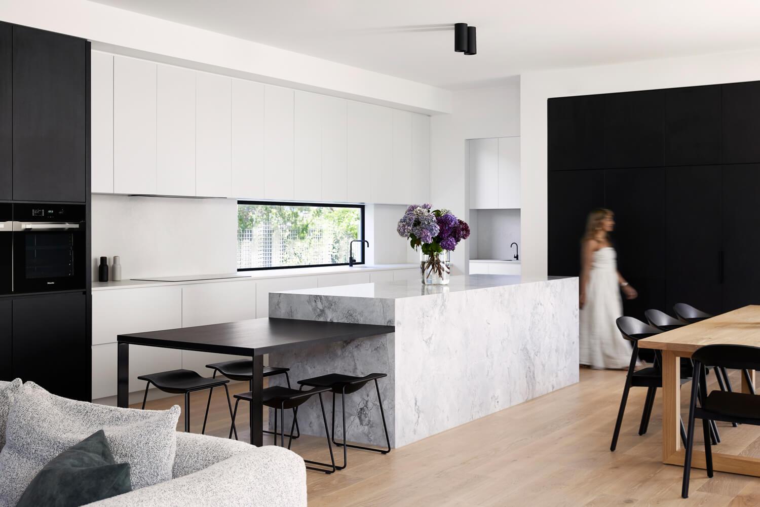 Minimalist Kitchen Layout With Natural Stone Benchtop