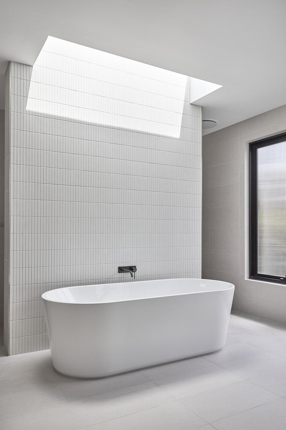 Thomas Archer custom designed ensuite with skylight over bathtub