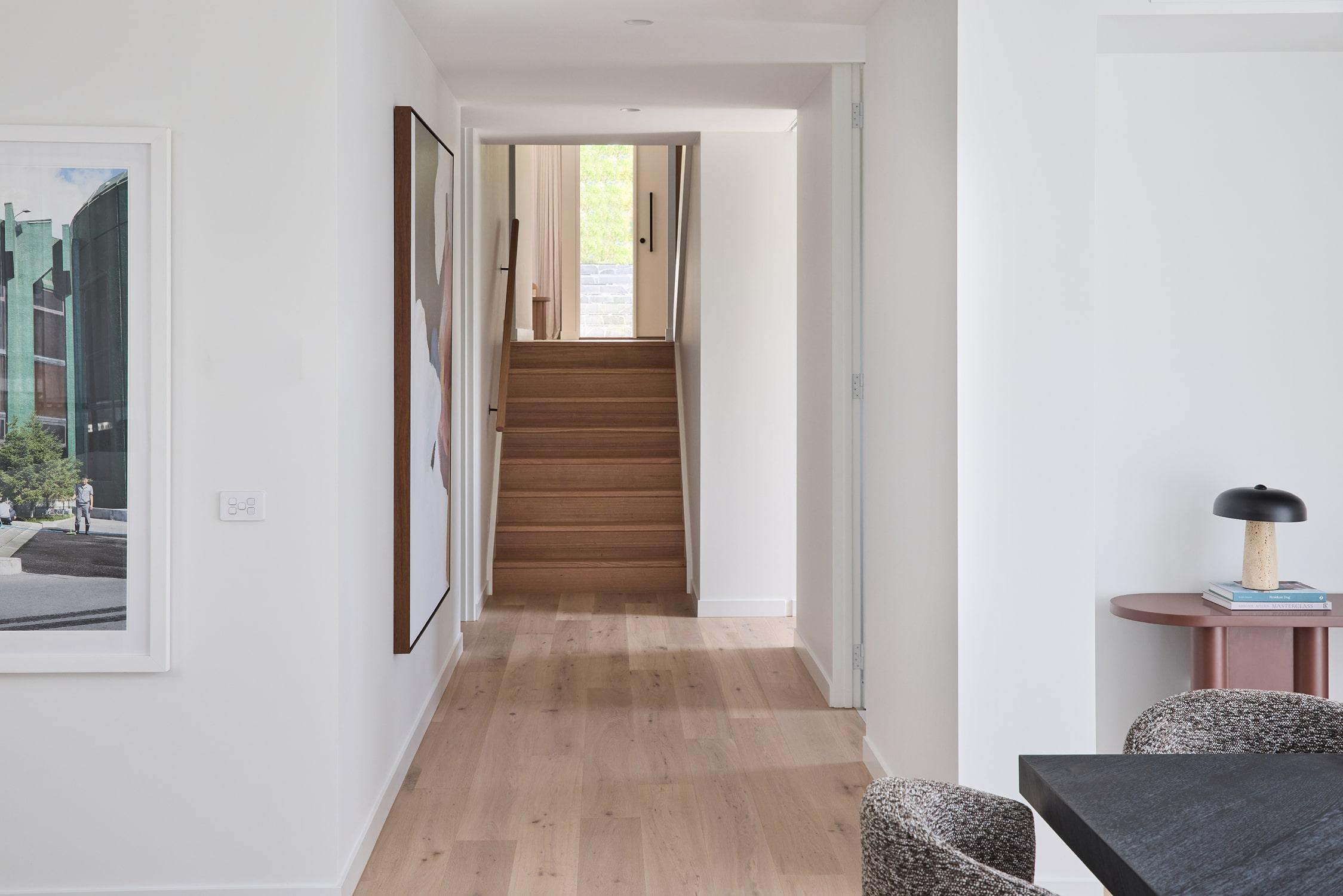 Hallway with split level entrance custom designed by Thomas Archer