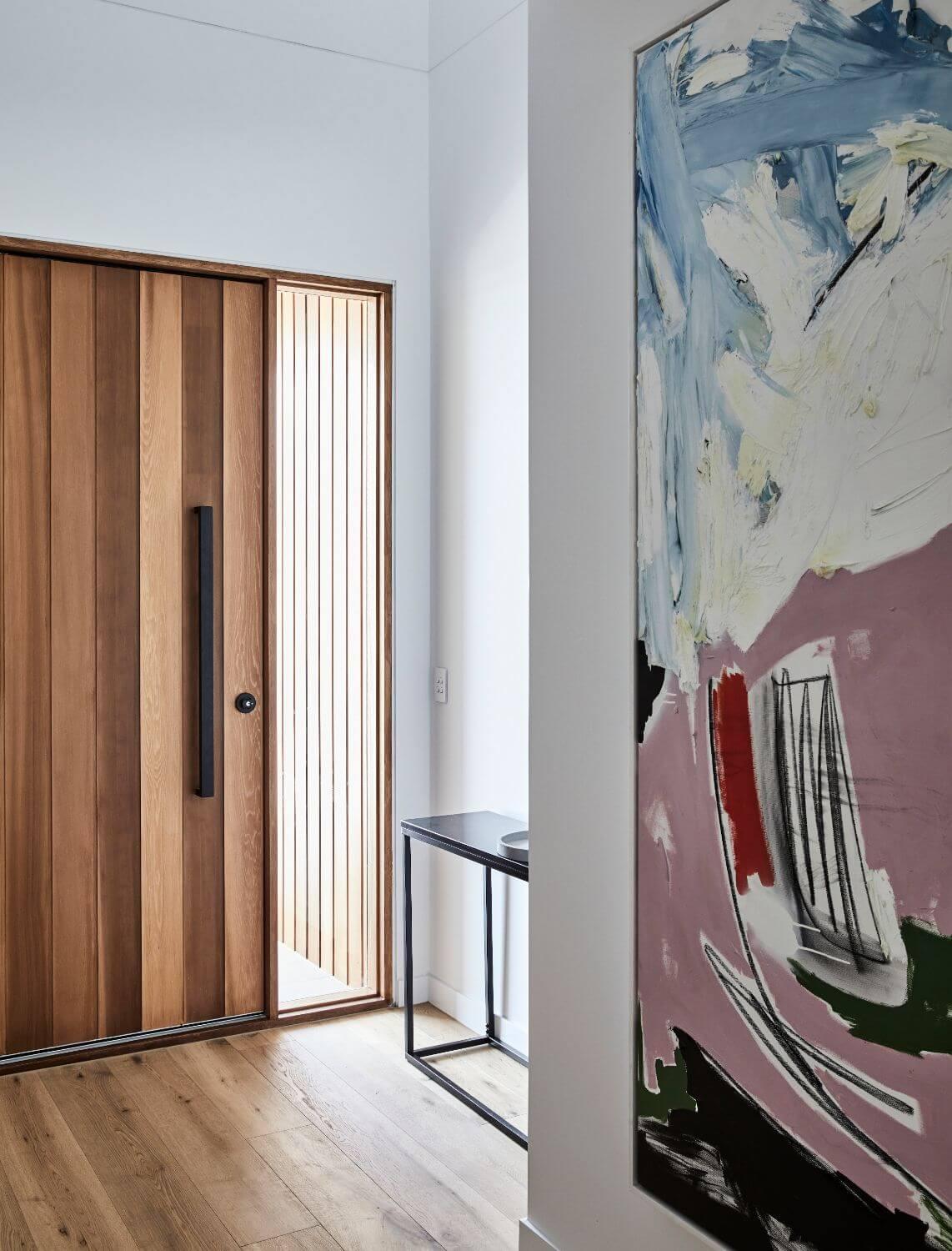 Pivot Door And Contemporary Artwork At Entry