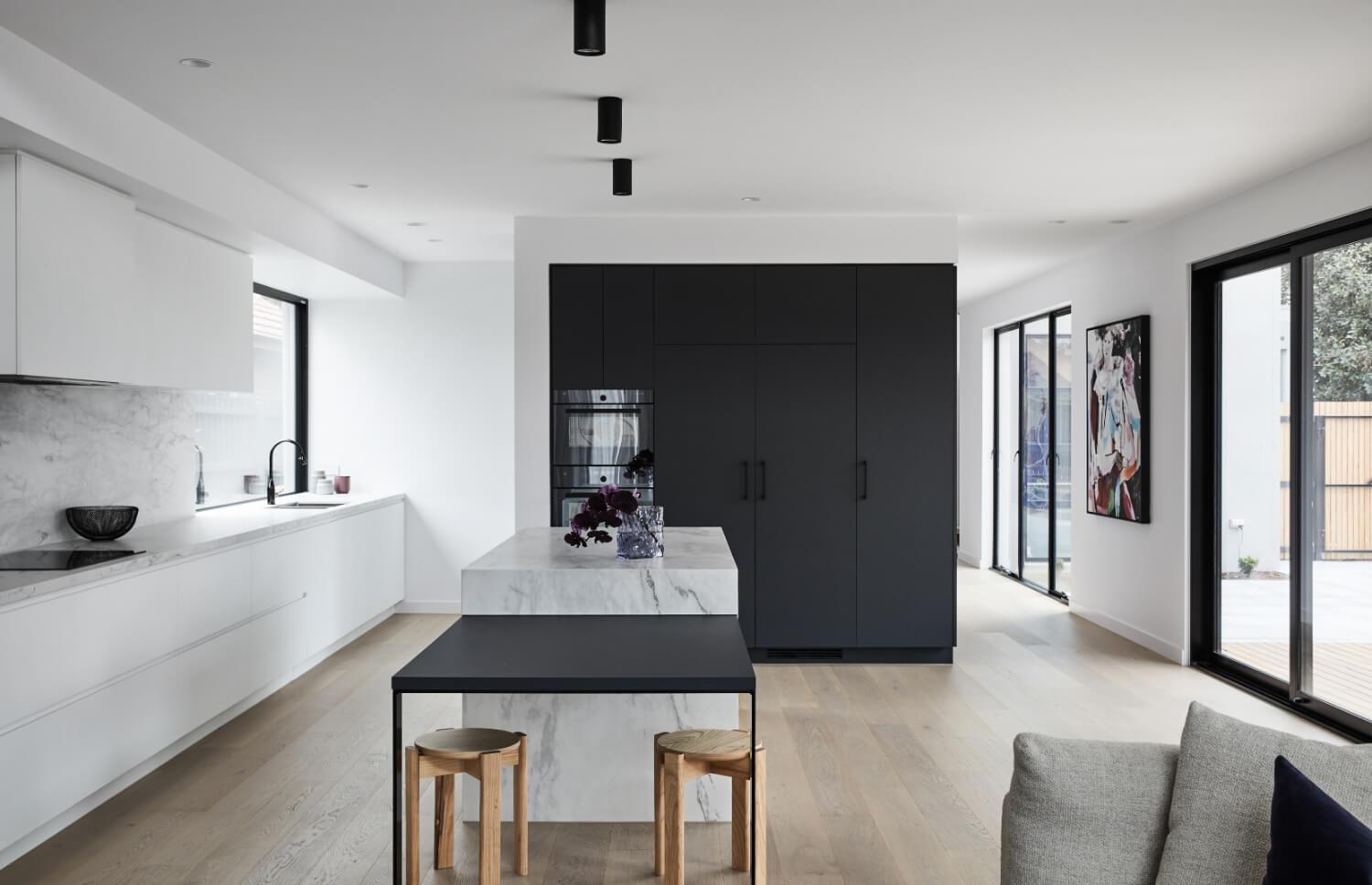 Contrasting Cupboards And Fittings Contrast Light Stone And Cabinetry In Kitchen