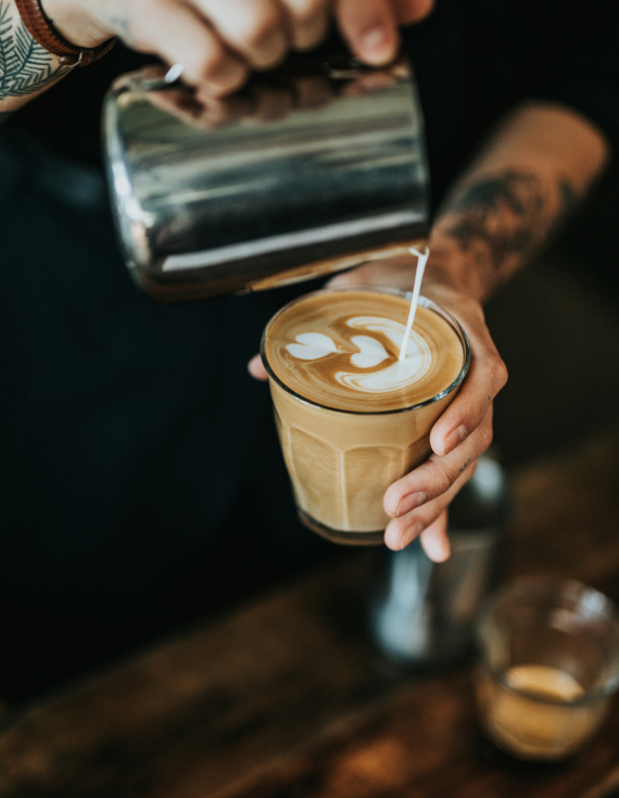 Barista making a latte