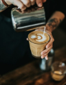 Barista making a latte