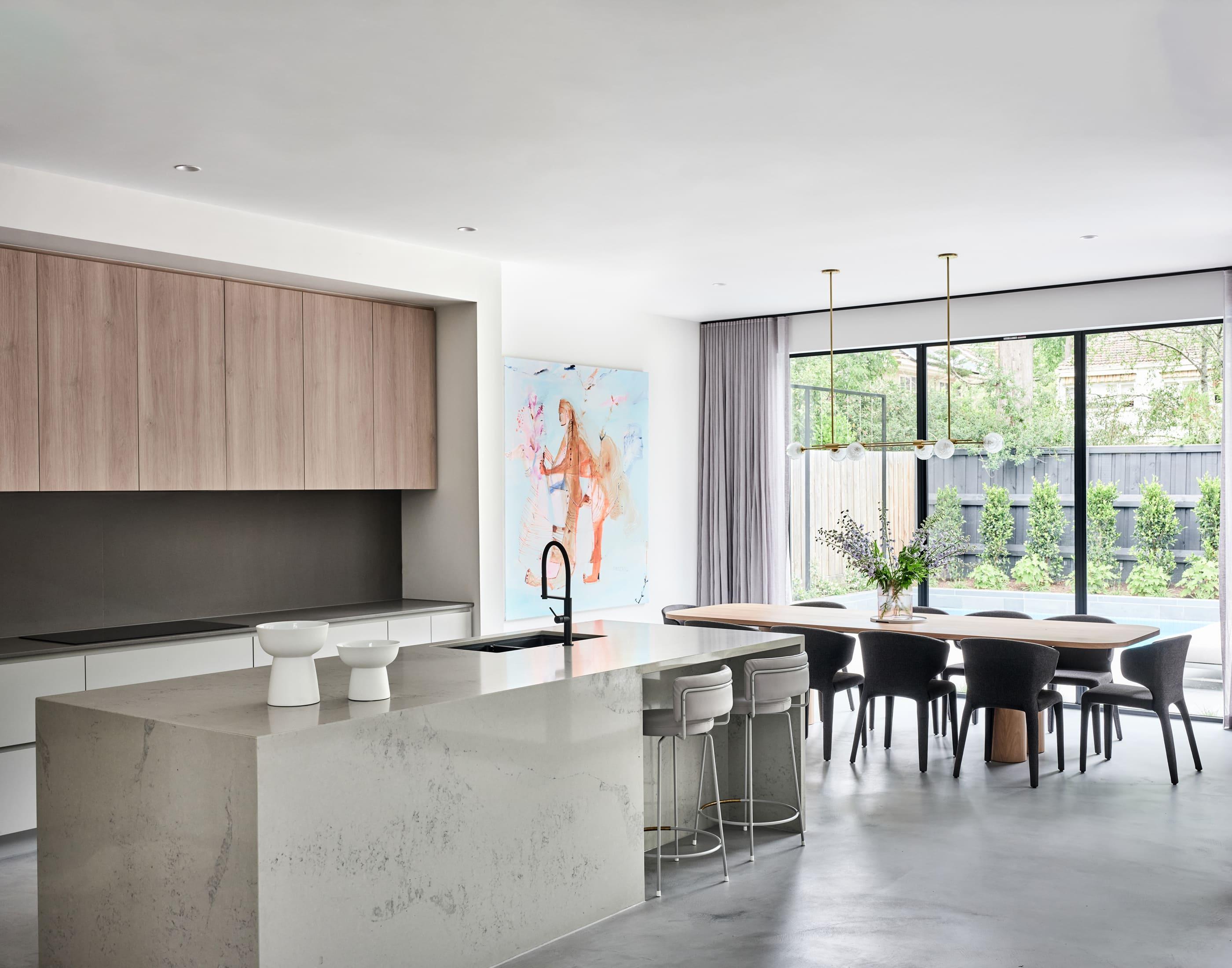 Modern kitchen and dining area in new home