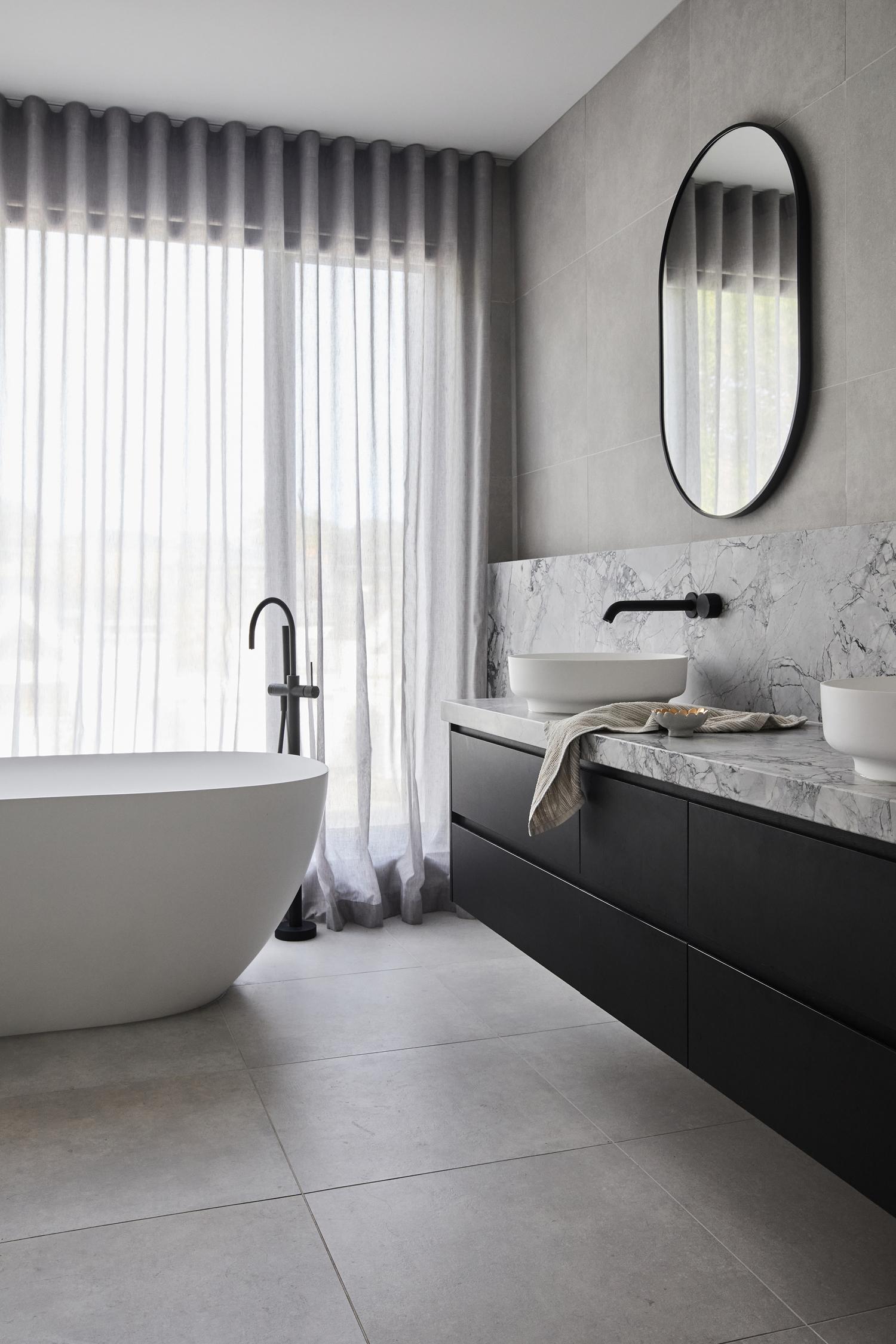 Thomas Archer Caulfield South Residence master ensuite showcasing large format tiles and Super White stone joinery