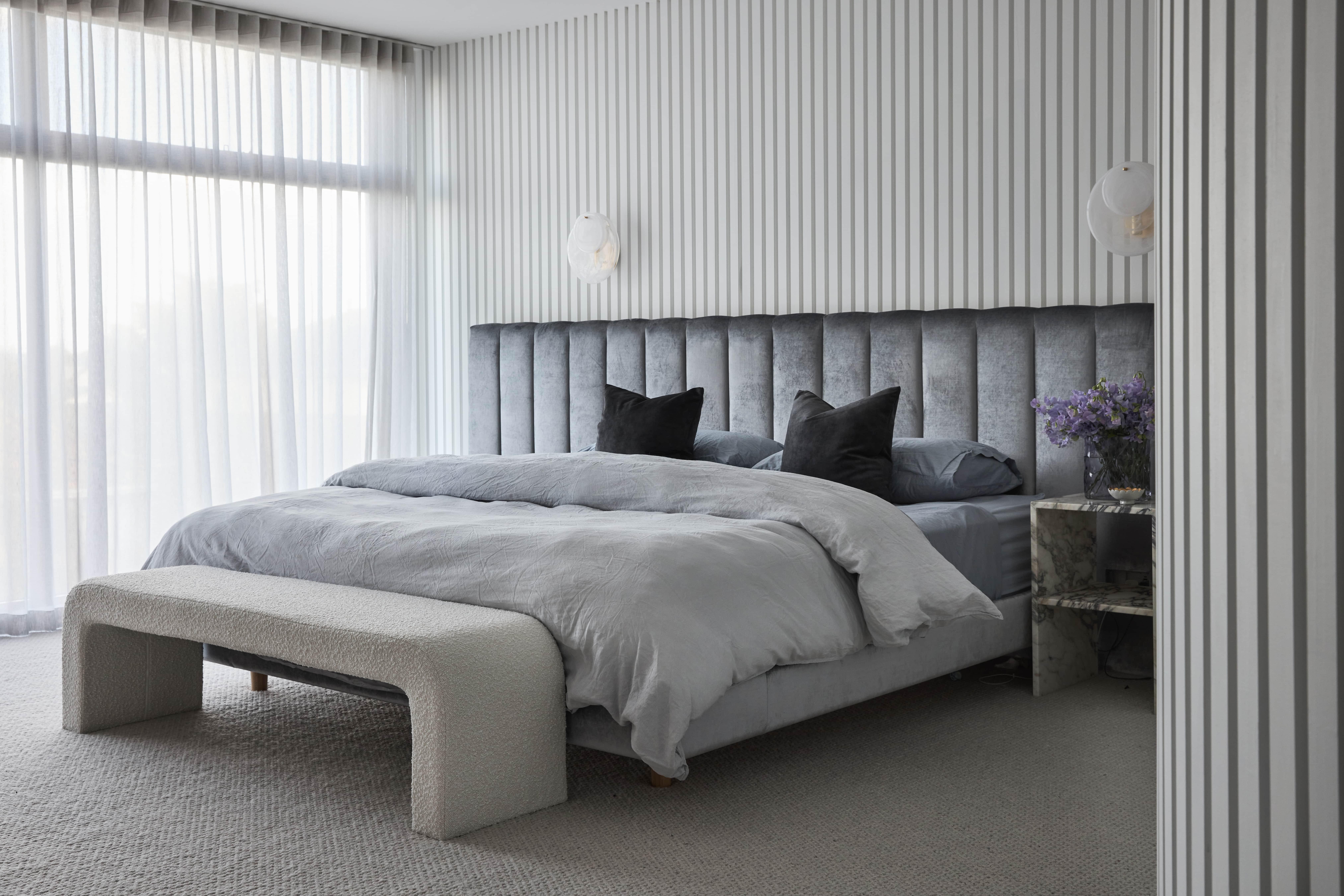Master bedroom with floor-to-ceiling cladding at the Strathmore Residence, designed and built by Thomas Archer.