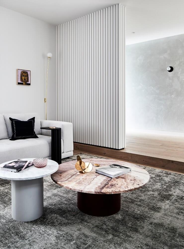 White Timber Feature Wall Separating Entry And Front Living Room