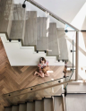 Void Showcases Open Staircase With Clear Balustrade