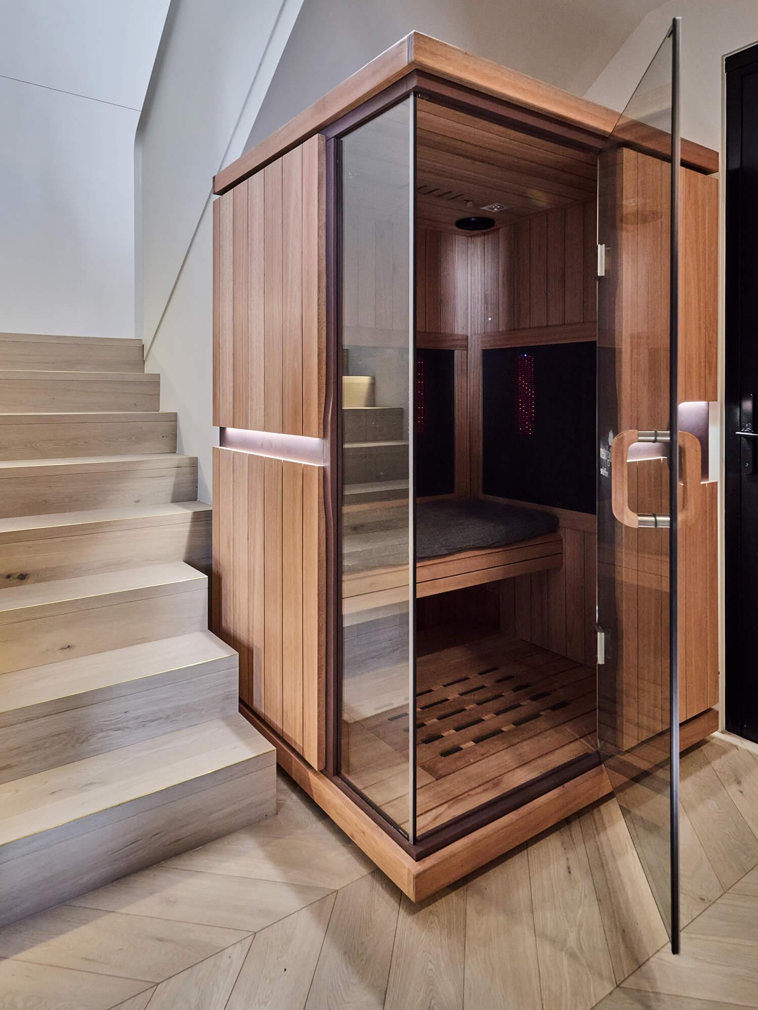 Sauna in an integrated wellness space within the basement of a custom, architecturally designed Thomas Archer home.