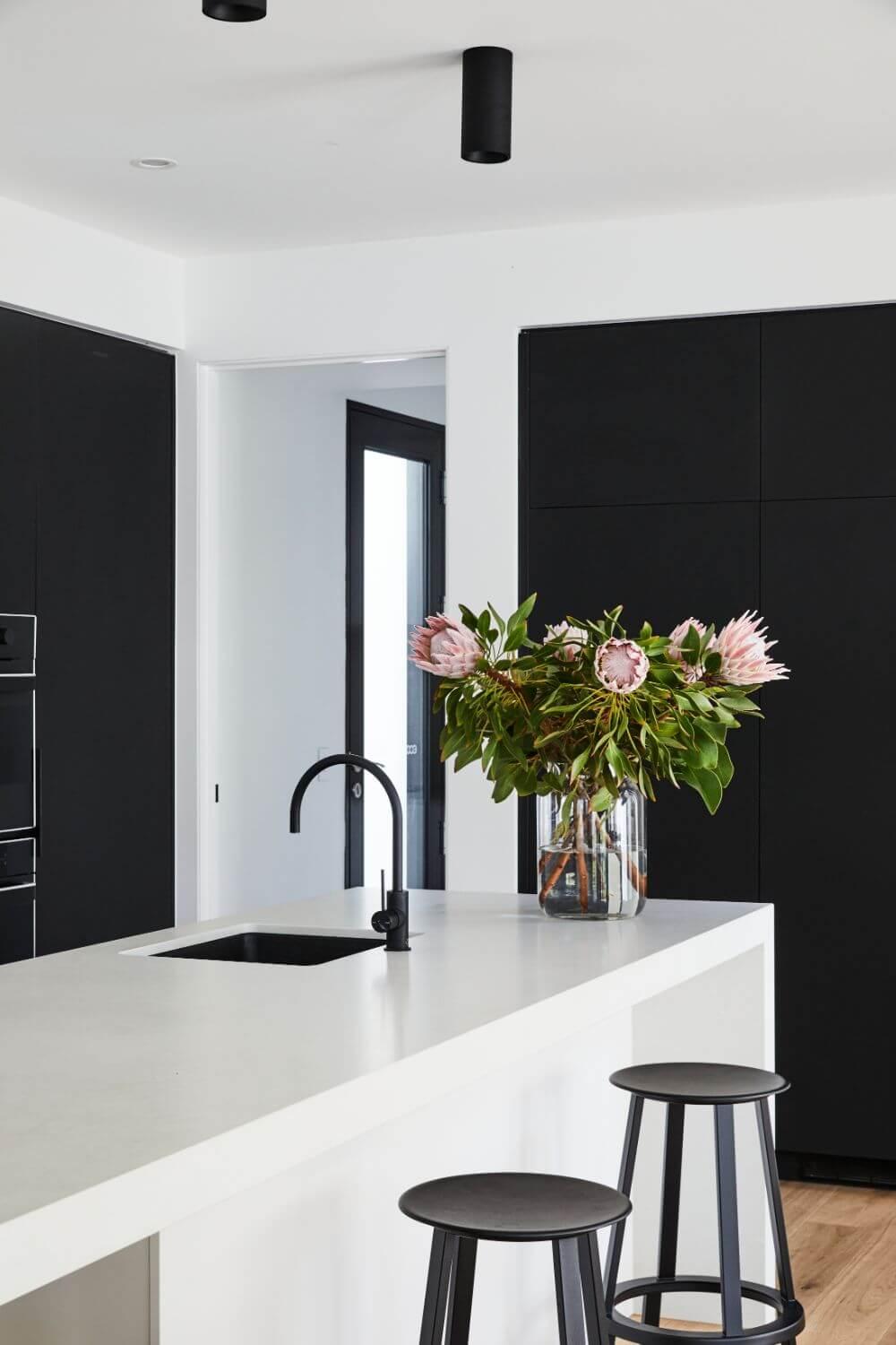 Natural White Stone Benchtop With Minimalist Cabinetry