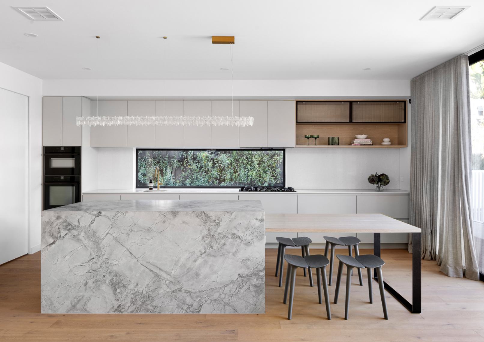 Modern Kitchen with large stone island bench